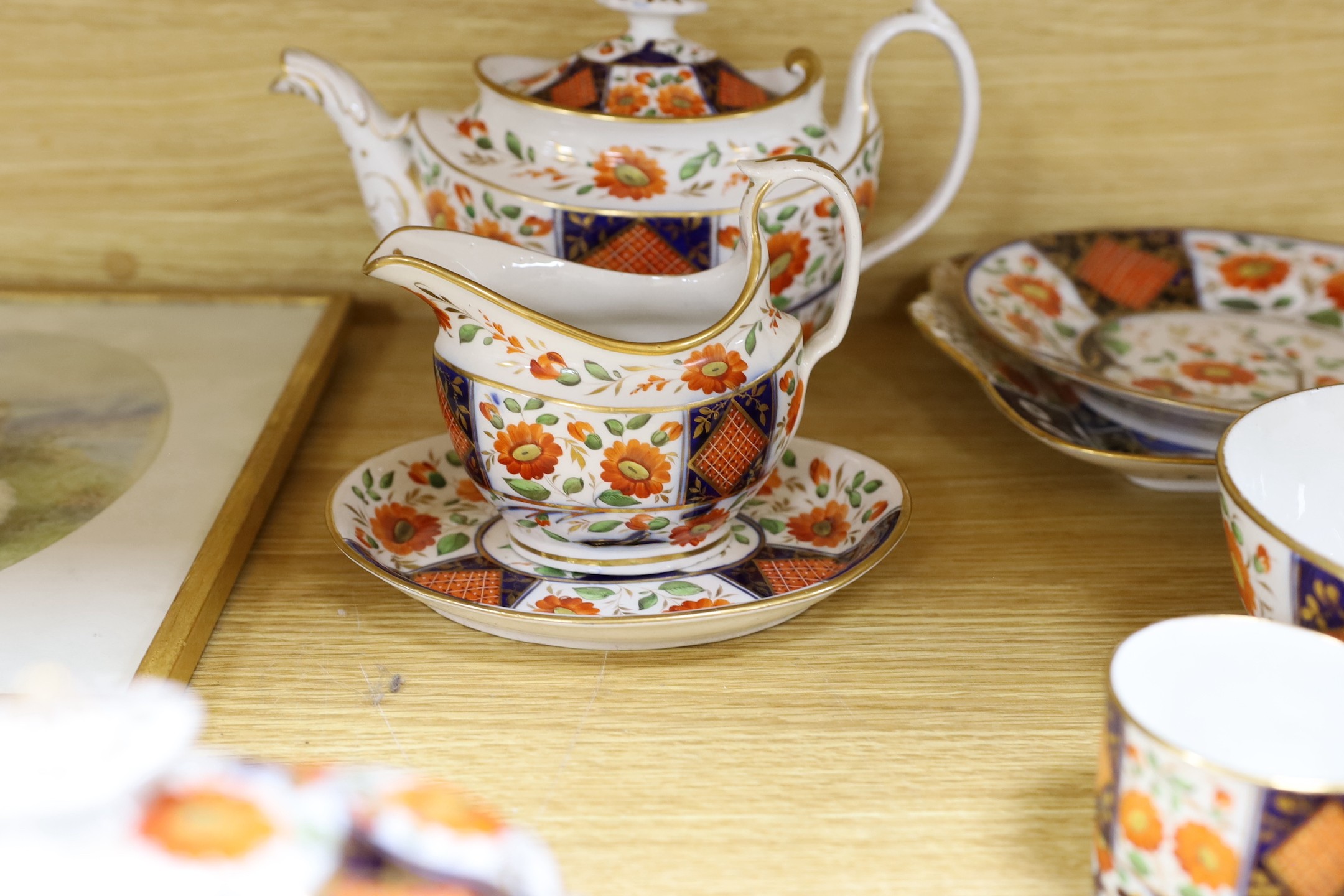 A 19th century English porcelain part tea and coffee set, probably Coalport and a similar Wedgwood part set